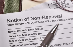 Insurance coverage documents and pen
